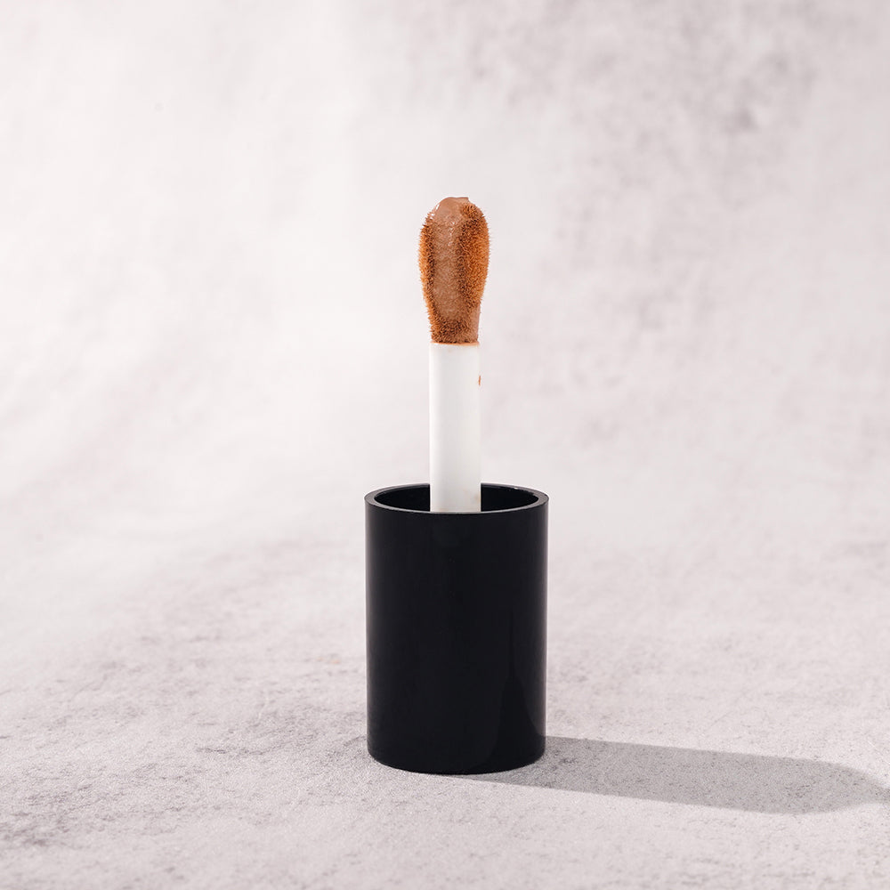 CONCEALER cruelty-free makeup good liquid full coverage small black cap round tube