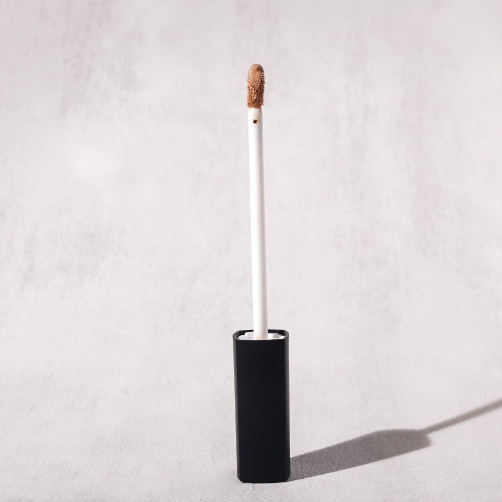 CONCEALER waterproof full coverage vegan black cap gold hoop scrub tube